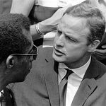 James Baldwin with Marlon Brando during the March on Washington, August 1963. (<a href="http://www.gettyimages.com/license/1445248">Hulton Archive</a>/Getty Images)